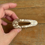 Barrette triangle dorée